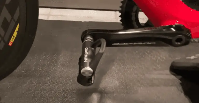 Garmin Vector 3 Pedal on a black crank shaft with red bike body